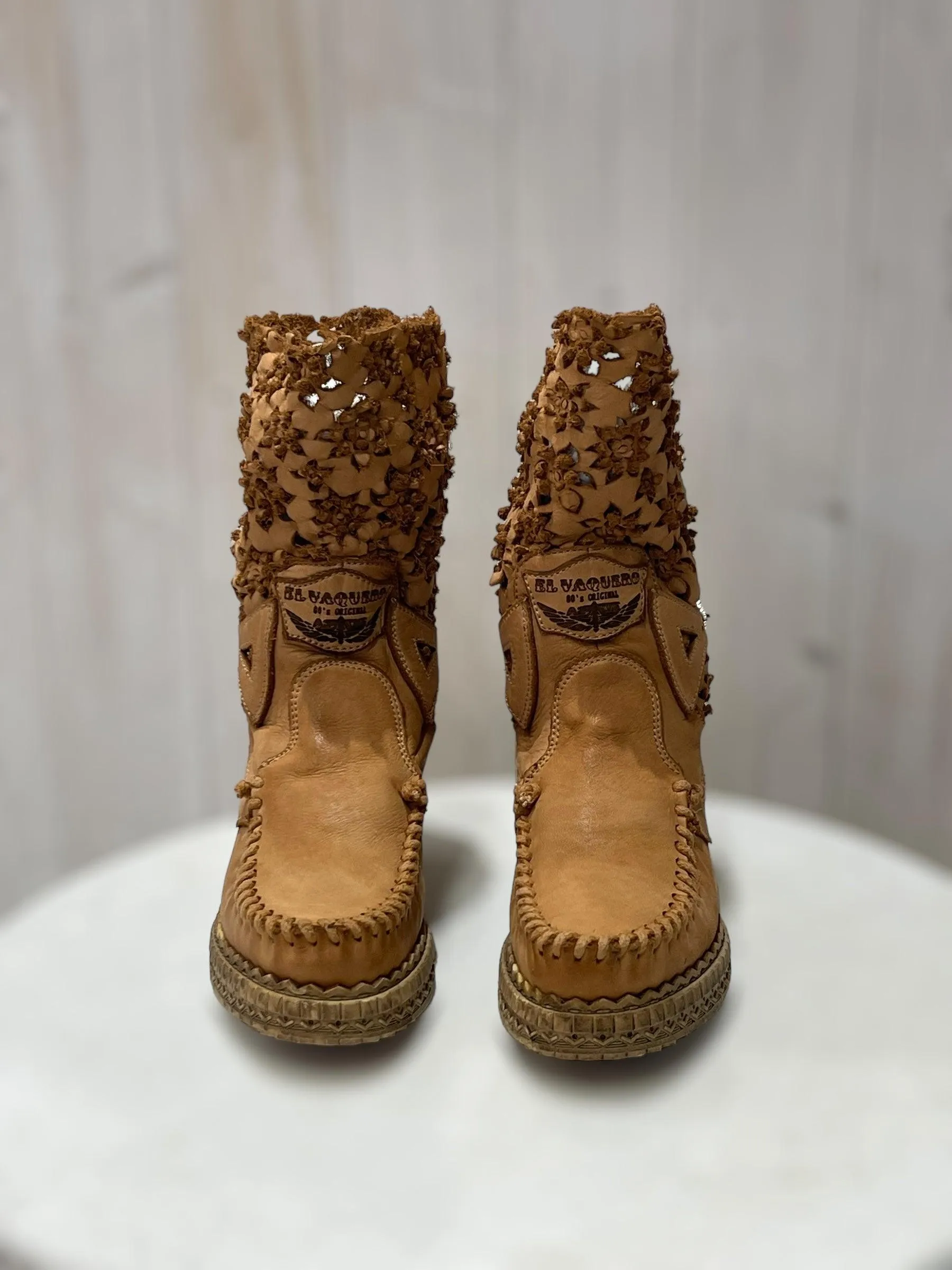 Laser Cut Leather Wedge Boots Fergie